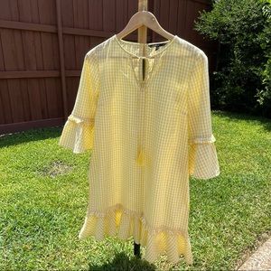 Brand new plaid patterned yellow and white tunic with a soft material. Fits M-L.